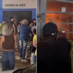 Lotérica pega fogo e porta é derrubada por populares para conter chamas; veja vídeo